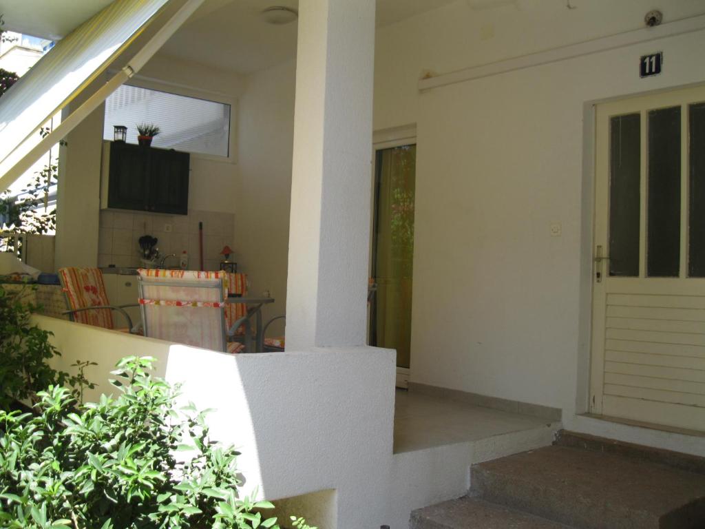 Televízia a/alebo spoločenská miestnosť v ubytovaní Centar Guest house