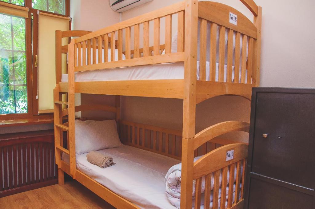 Postel nebo postele na pokoji v ubytování Globus Hostel