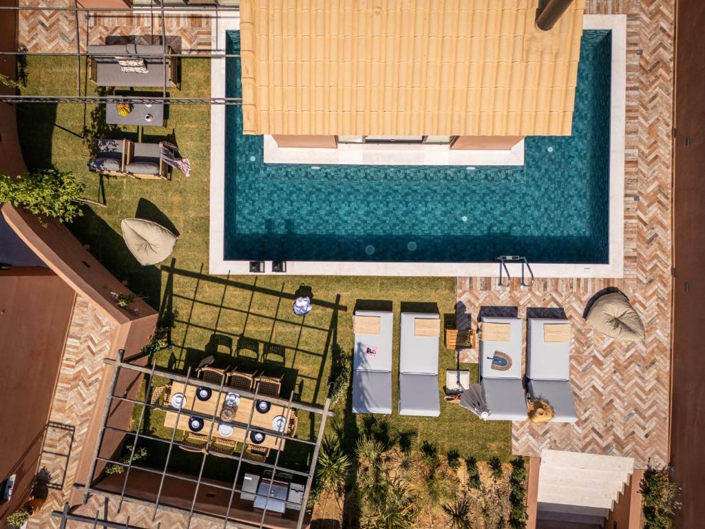 Swimmingpoolen hos eller tæt på Arcasa Villas Collection by Omilos Hotels