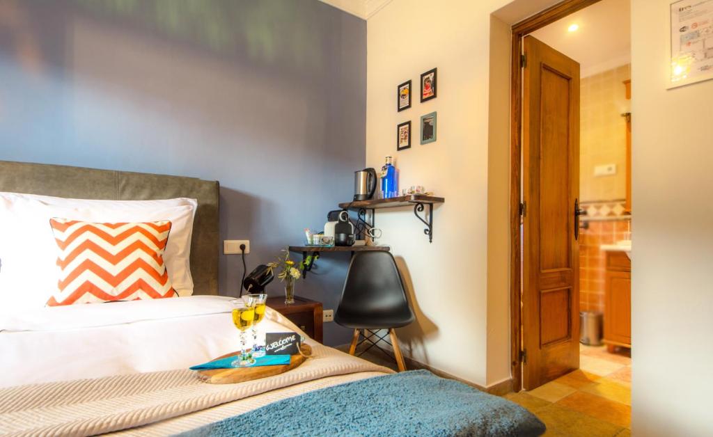 Postel nebo postele na pokoji v ubytování Villa Conmigo Bed & Breakfast