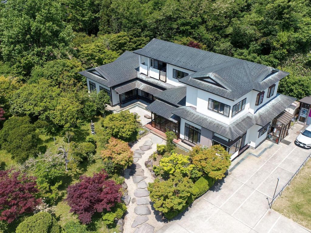 an aerial view of a house with a garden at みんなの実家門脇家 in Akita