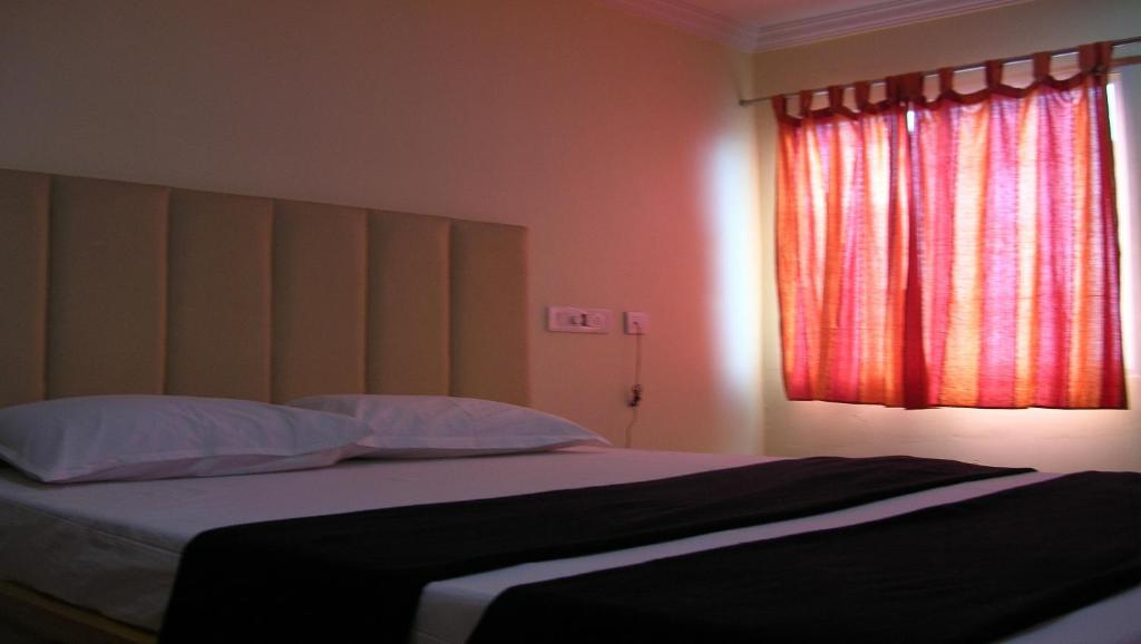 Postel nebo postele na pokoji v ubytování Hotel Woodside