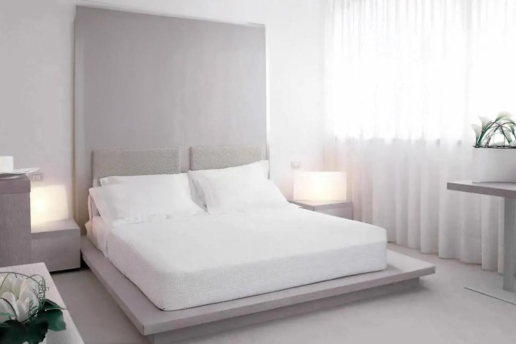 Postel nebo postele na pokoji v ubytování B&B HOTEL Padova Methis