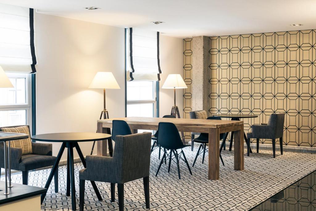 Posezení v ubytování Hotel Mercure Jardines de Albia