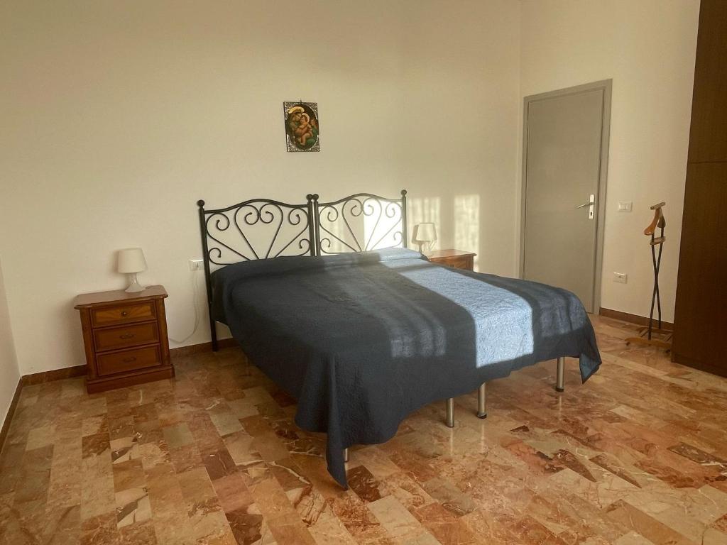 Postel nebo postele na pokoji v ubytování Appartamento Villa Caprareccia