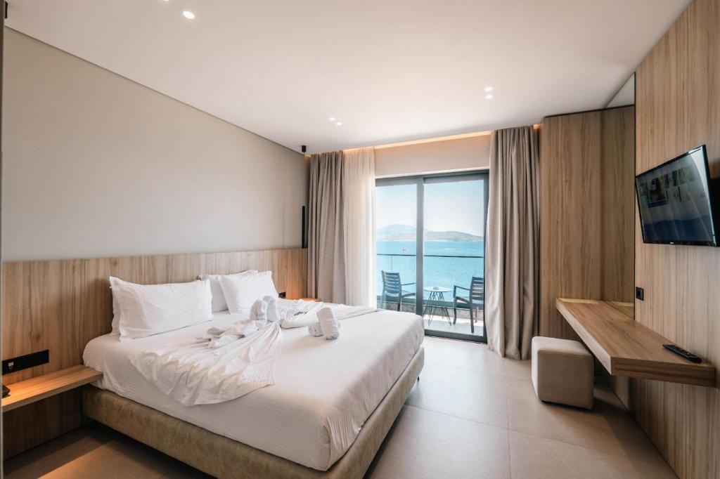 Postel nebo postele na pokoji v ubytování Hotel Portanova