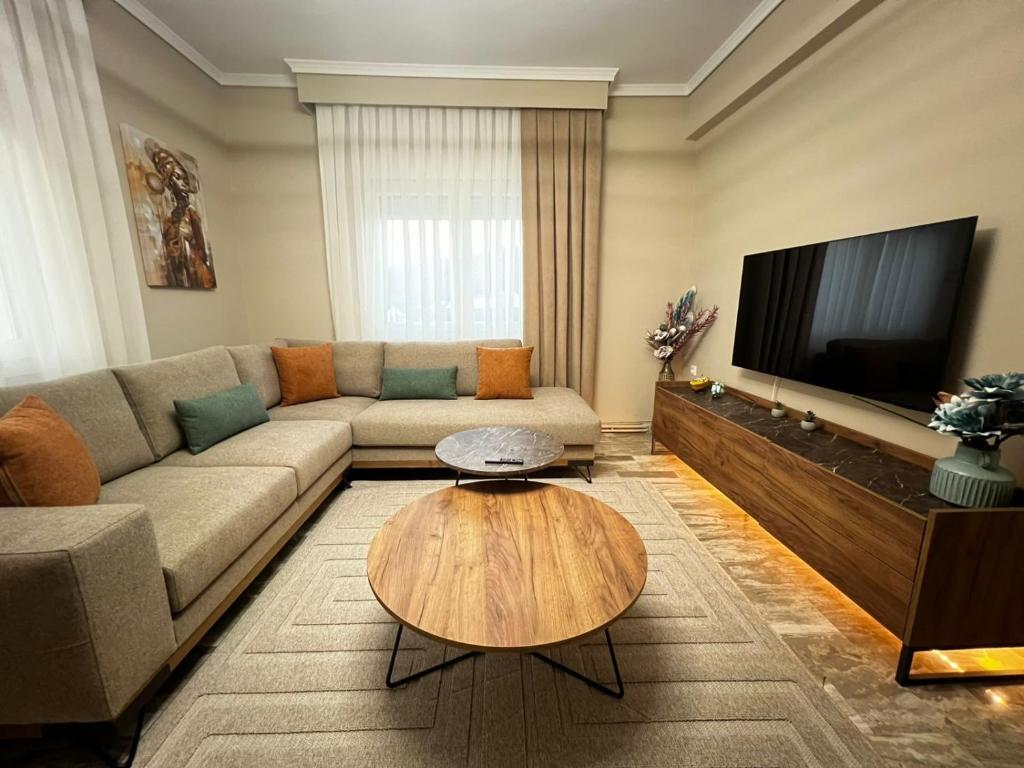 a living room with a couch and a coffee table at Modern Makri in Makri