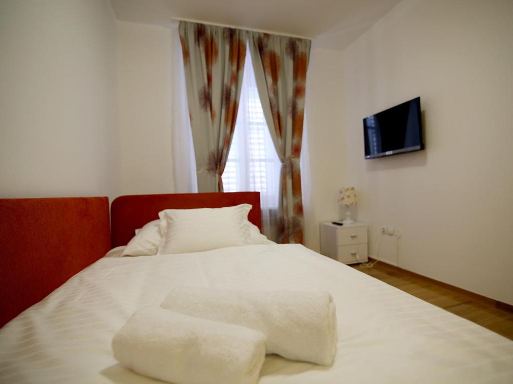 Posteľ alebo postele v izbe v ubytovaní A&G Apartments