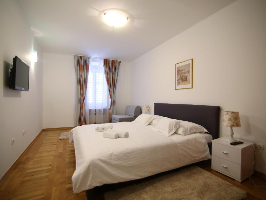 Posteľ alebo postele v izbe v ubytovaní A&G Apartments
