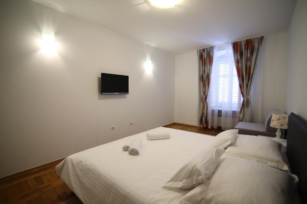 Posteľ alebo postele v izbe v ubytovaní A&G Apartments