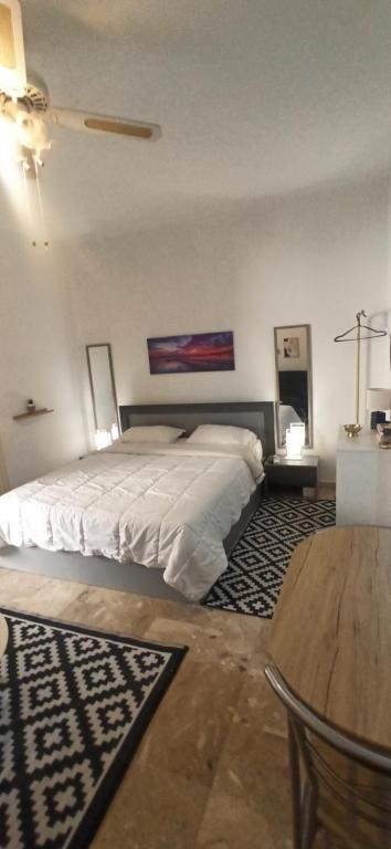 Ένα ή περισσότερα κρεβάτια σε δωμάτιο στο Litsa Panos cozy studio Potidea