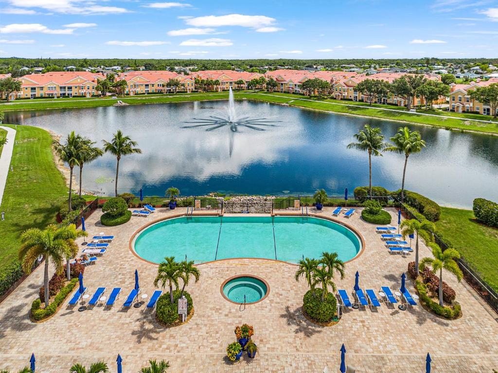 an aerial view of a pool at a resort at Peaceful and Relaxing Community - Peace of Cape - Roelens in Cape Coral