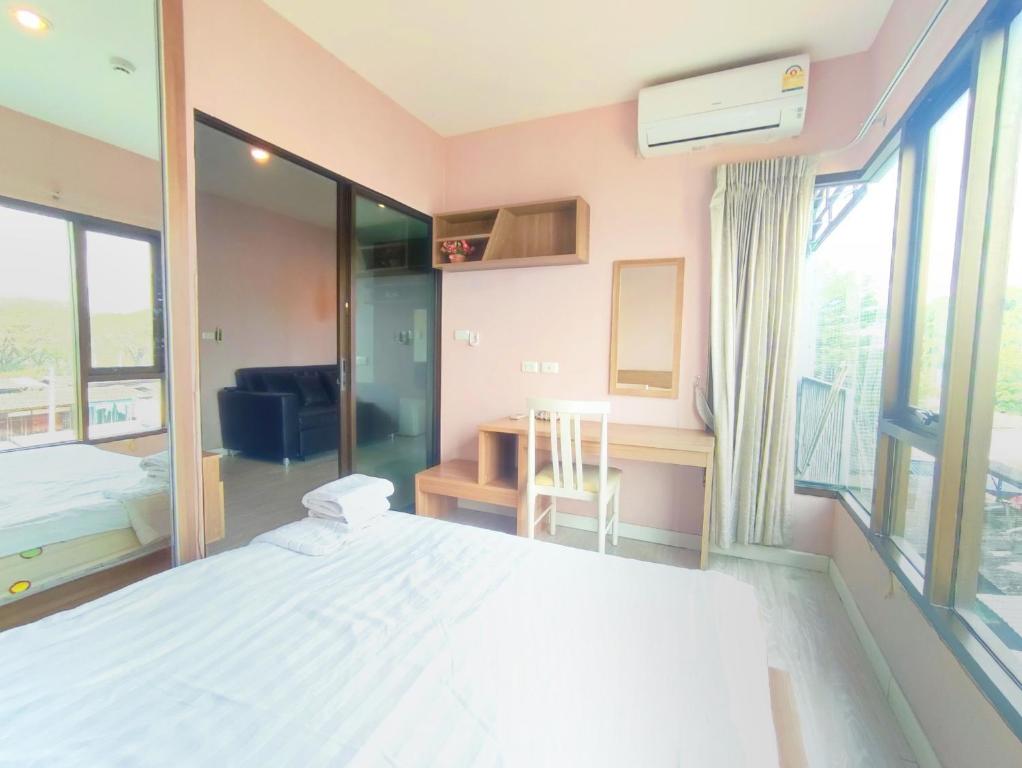 Deluxe Room at Tree Boutique Condo by Suwan Style Agency - Resim 11