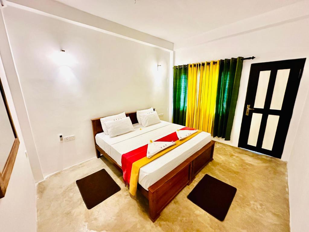 Postel nebo postele na pokoji v ubytování Otara Garden