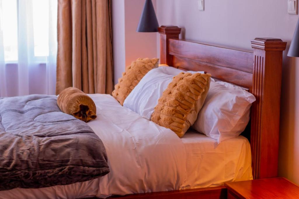 Ένα ή περισσότερα κρεβάτια σε δωμάτιο στο Emerald &Saphire