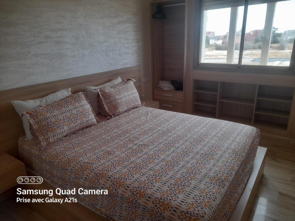Katil atau katil-katil dalam bilik di Residence Aya Sidi Bouzid Marrequos