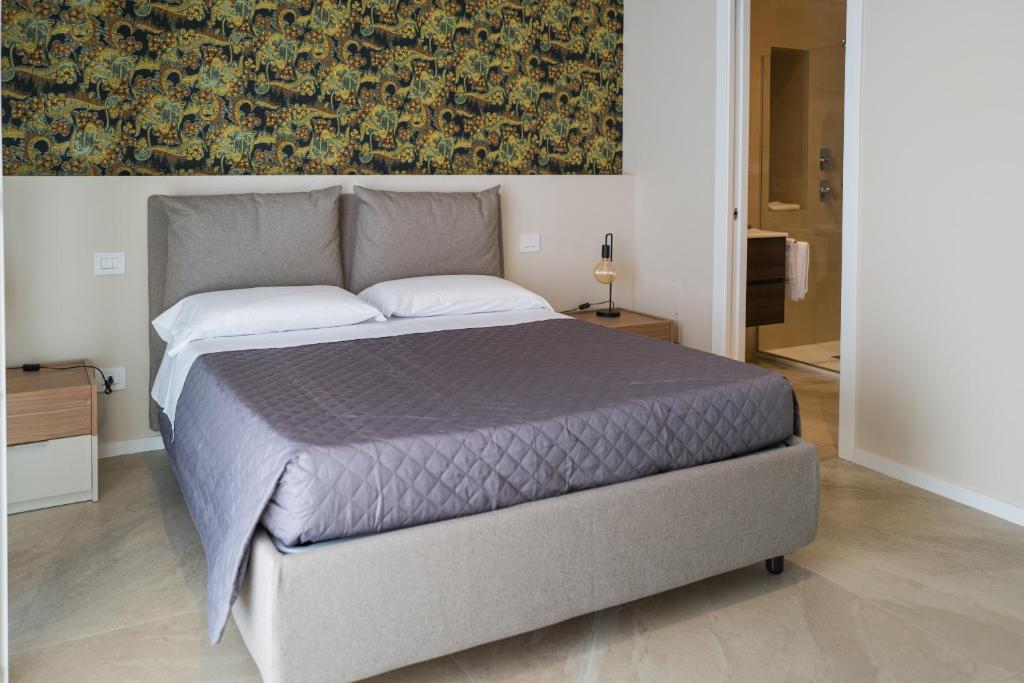 Postel nebo postele na pokoji v ubytování B&B Nonna Rosa - Via Castellucci