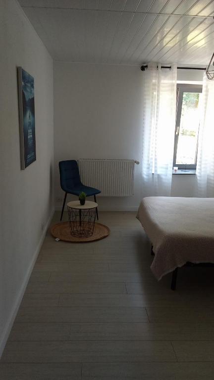 Postel nebo postele na pokoji v ubytování Gîte des Sagards