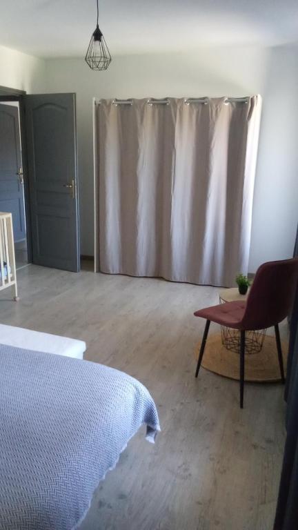 Postel nebo postele na pokoji v ubytování Gîte des Sagards