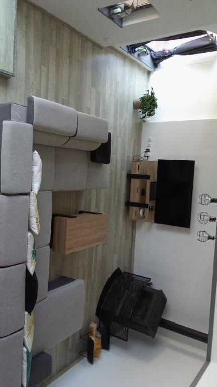 TV a/nebo společenská místnost v ubytování Gîte des Sagards