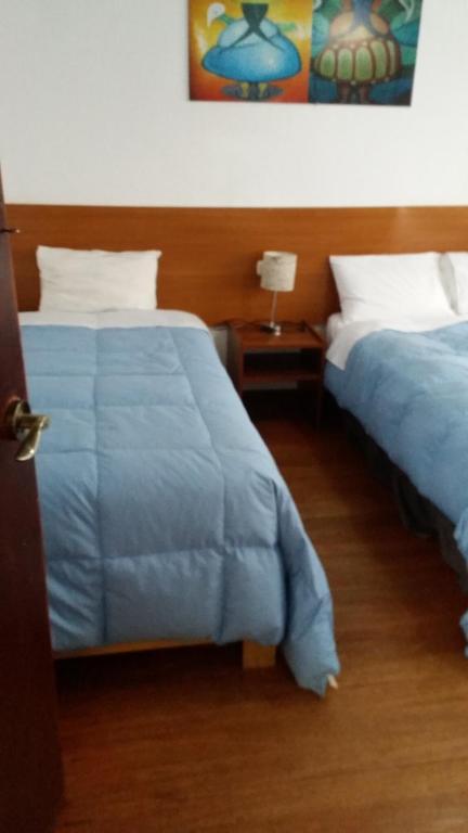 Postel nebo postele na pokoji v ubytování Inka's Rest Hostel
