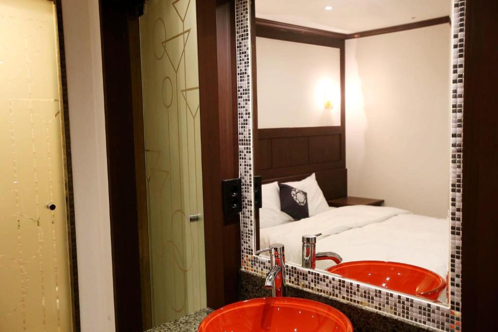 Postel nebo postele na pokoji v ubytování Hotel Cullinan Yongin