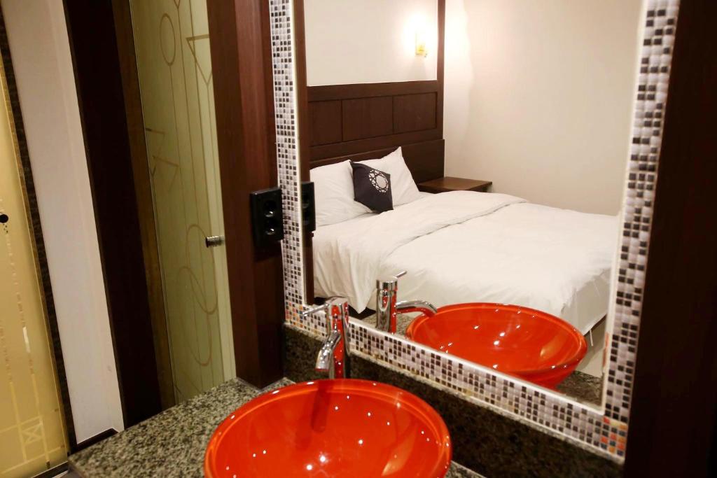 Postel nebo postele na pokoji v ubytování Hotel Cullinan Yongin