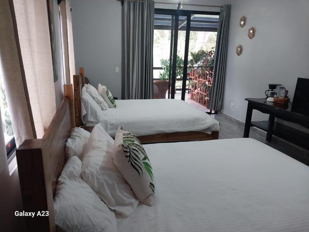 Katil atau katil-katil dalam bilik di Casa Honey
