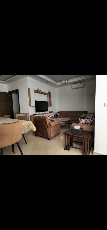 Posezení v ubytování Stunning modern villa apartment in mountains