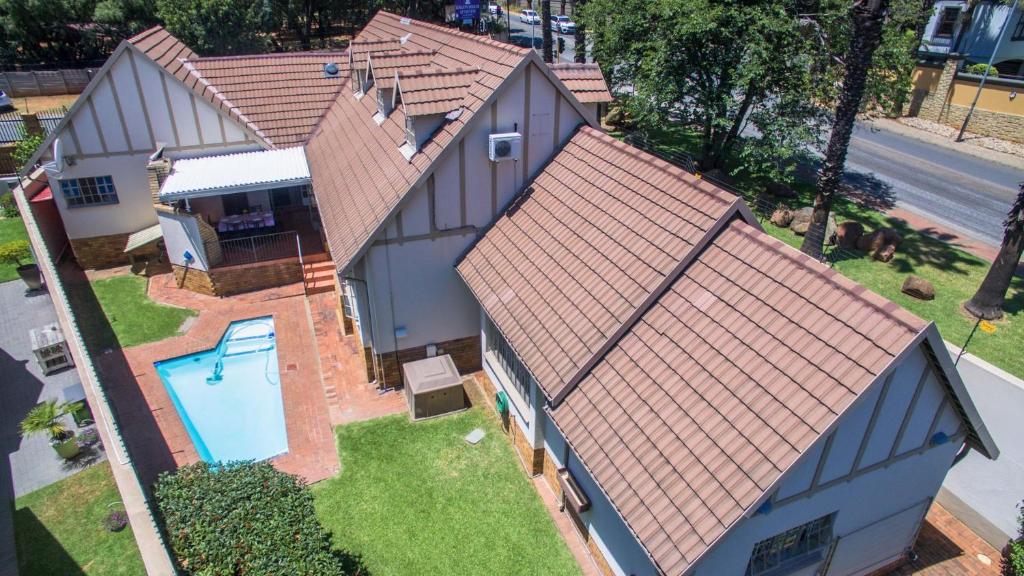 an overhead view of a house with a roof at Elegant 5BR House with Pool, Gourmet Kitchen and Reliable Generator in Johannesburg