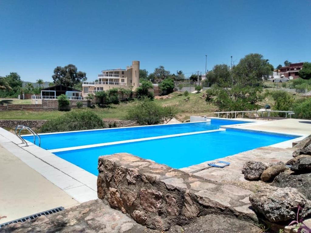 Swimmingpoolen hos eller tæt på Casa Carlos Paz Terrazas del Lago