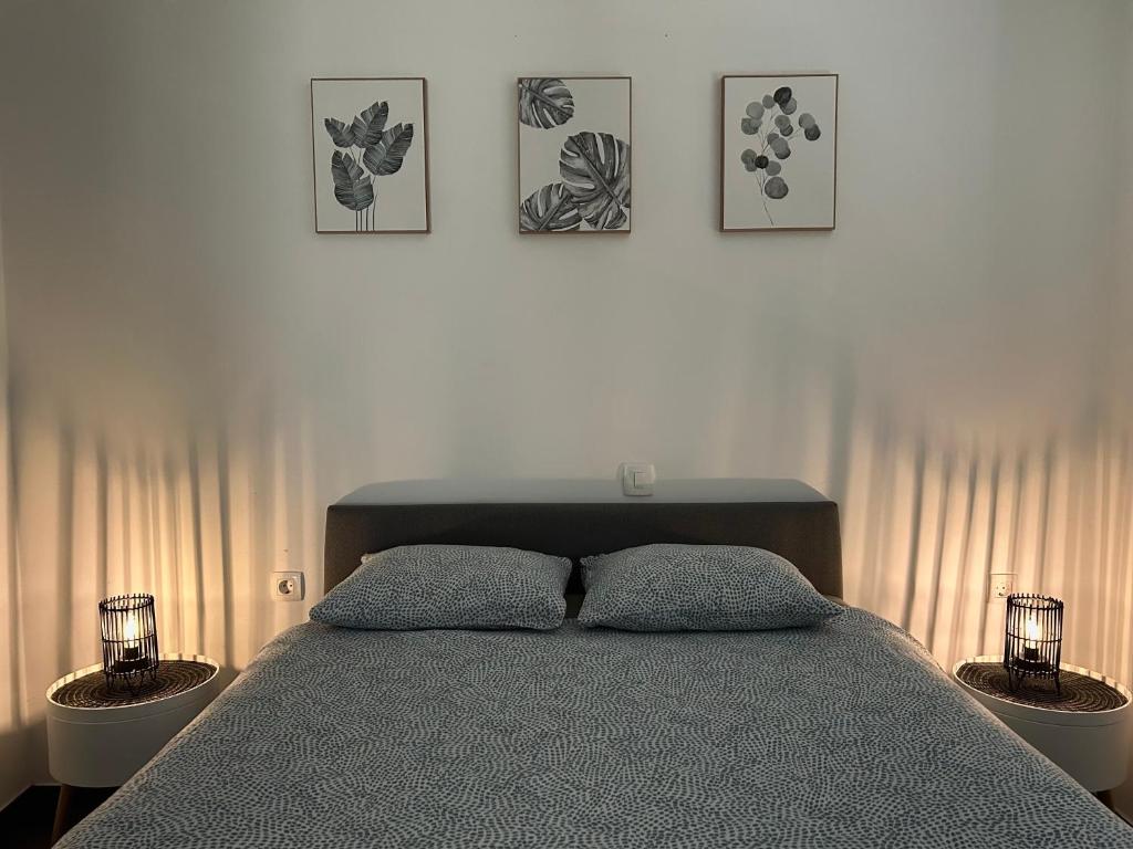 Postel nebo postele na pokoji v ubytování AURORA Apartment Banovci