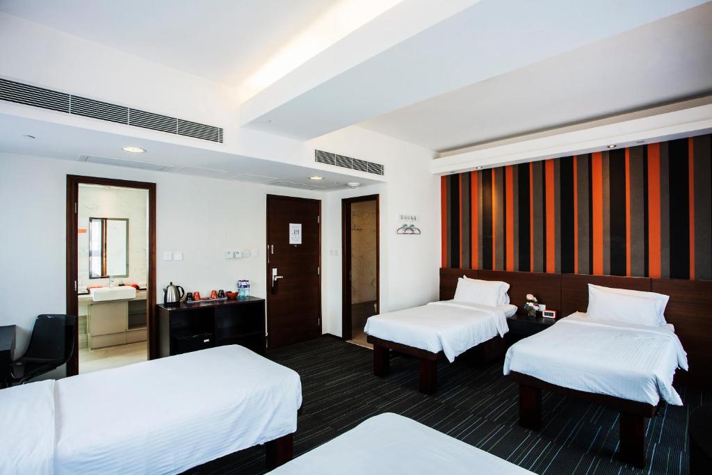 Postelja oz. postelje v sobi nastanitve Le Prabelle Hotel