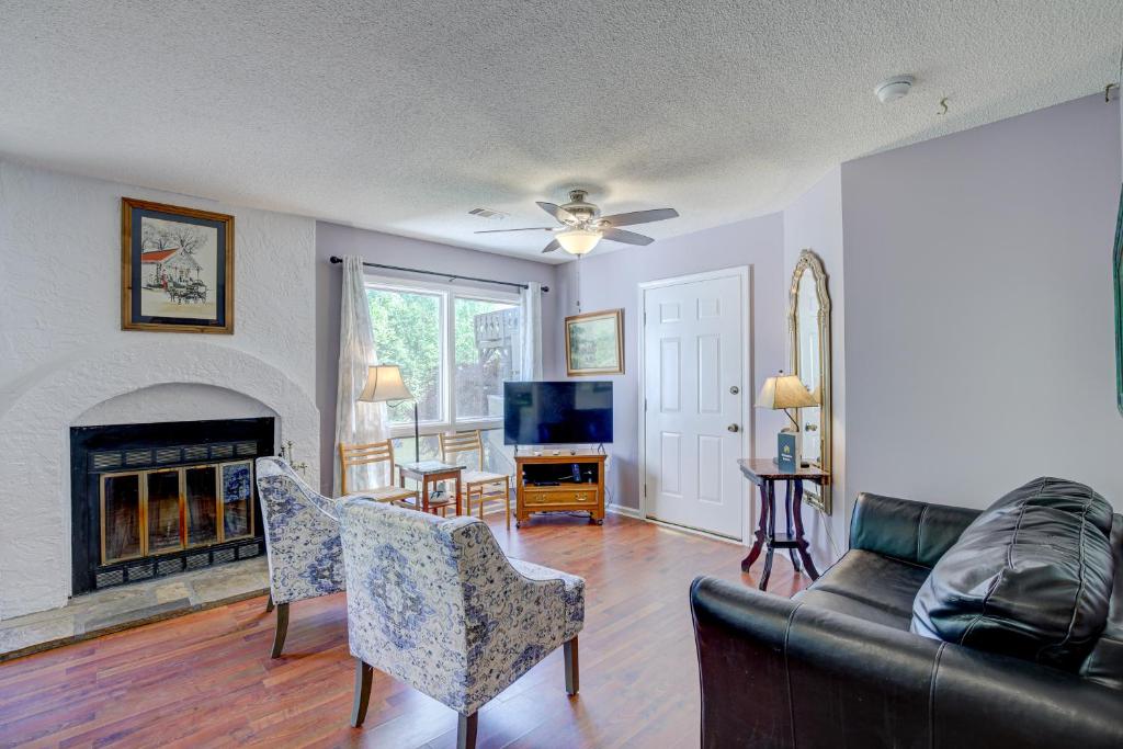 a living room with a couch and a fireplace at Rivers Edge - #402 in Helen