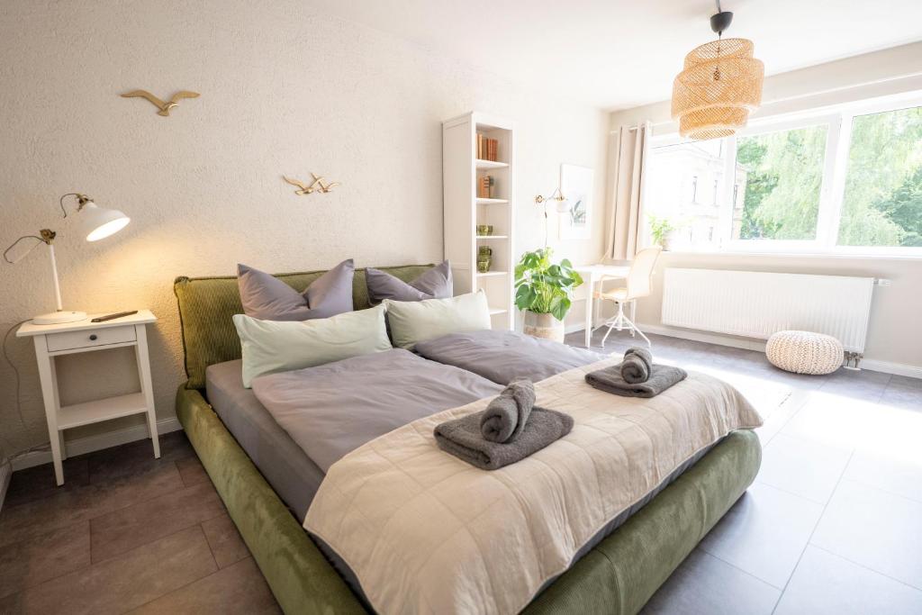 Ένα ή περισσότερα κρεβάτια σε δωμάτιο στο 4Tiny Together-Apartment - Balkon, Netflix, Nespresso, Messe