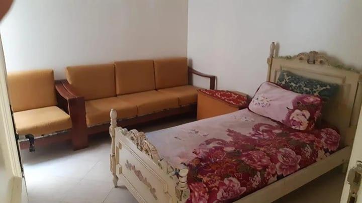Ένα ή περισσότερα κρεβάτια σε δωμάτιο στο El Jadida Guest Oasis