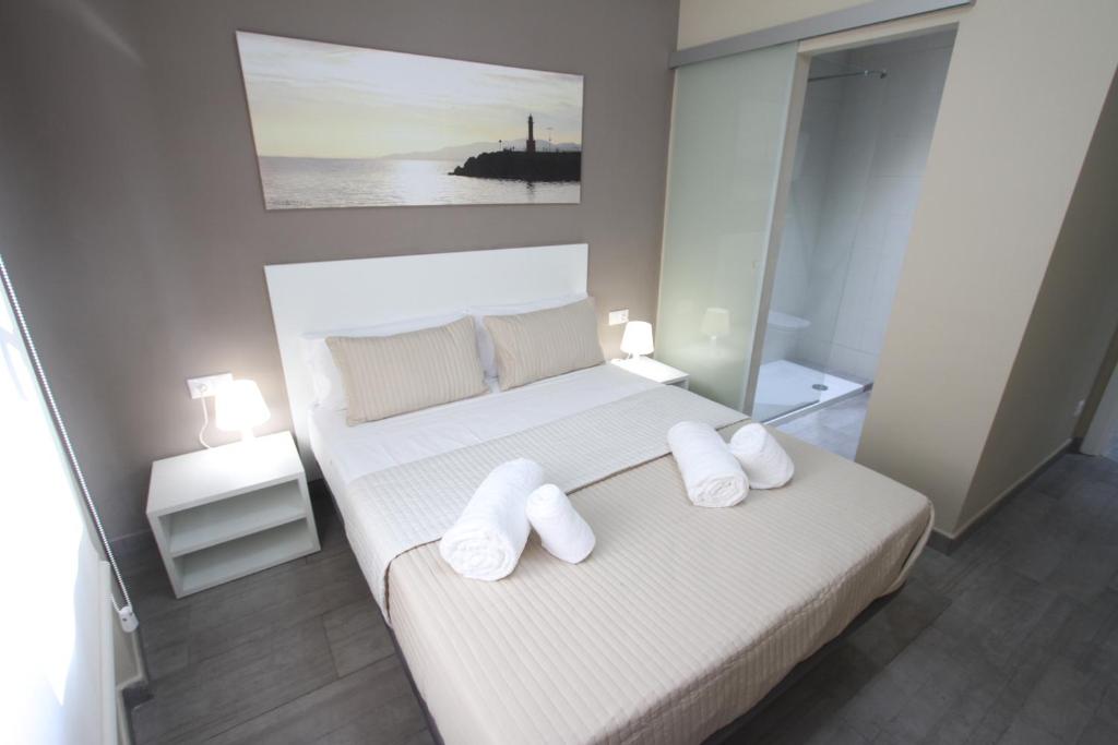 A bed or beds in a room at Apartamentos Cambrils Playa Spa