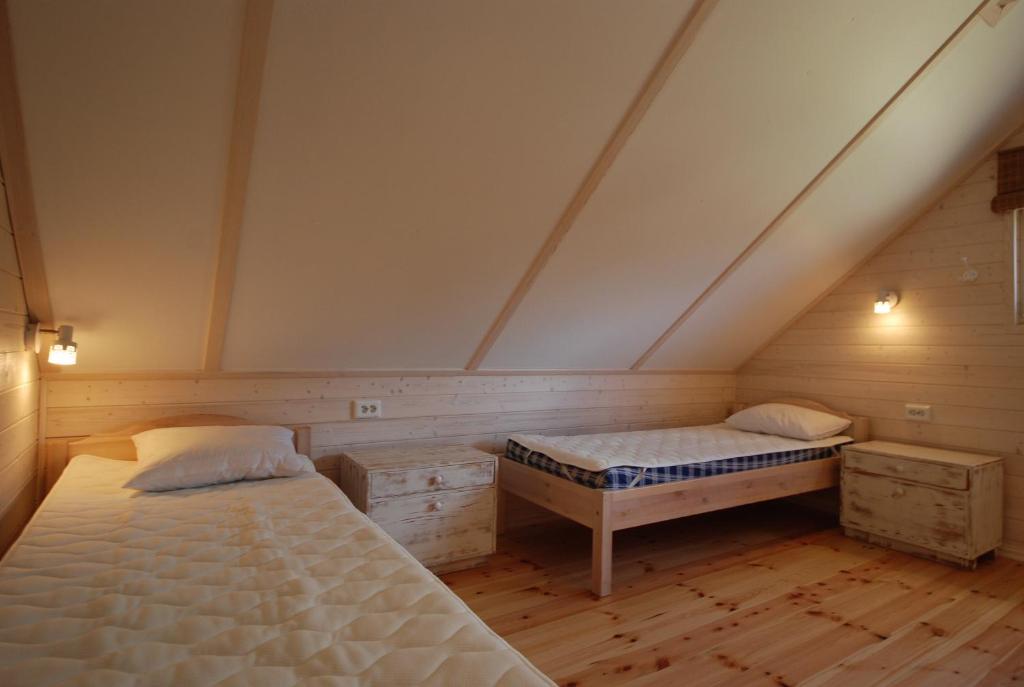 Postel nebo postele na pokoji v ubytování Mandjala Puhketalu - Cottages