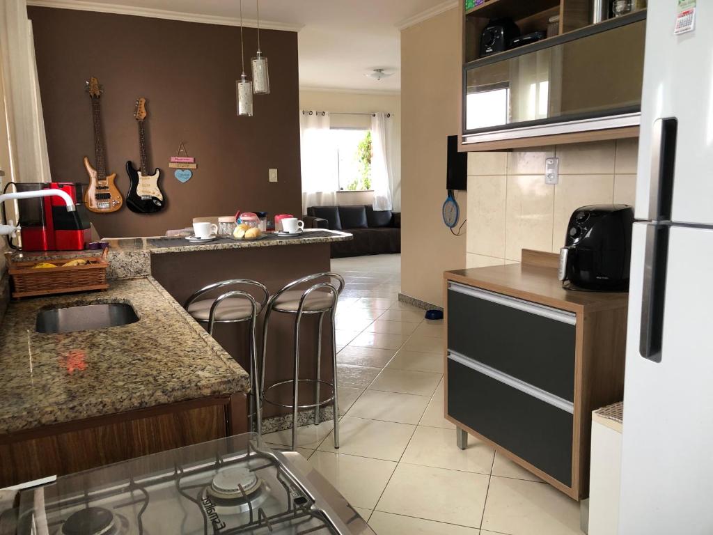 Køkken eller tekøkken på Casa Confortável e aconchegante