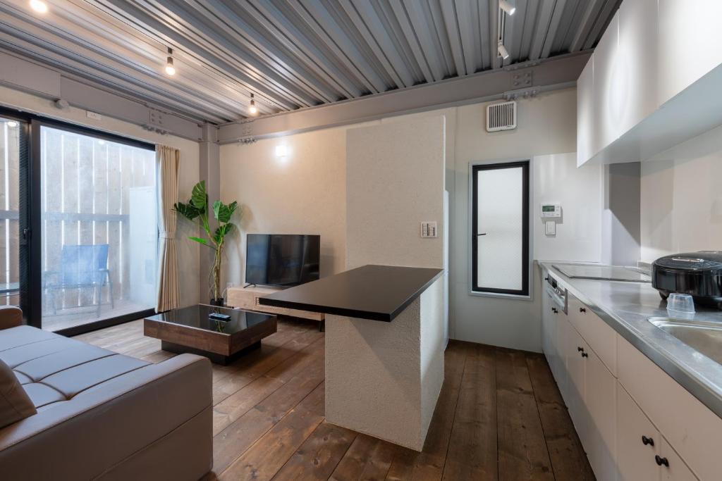 Kuchyň nebo kuchyňský kout v ubytování Funabori