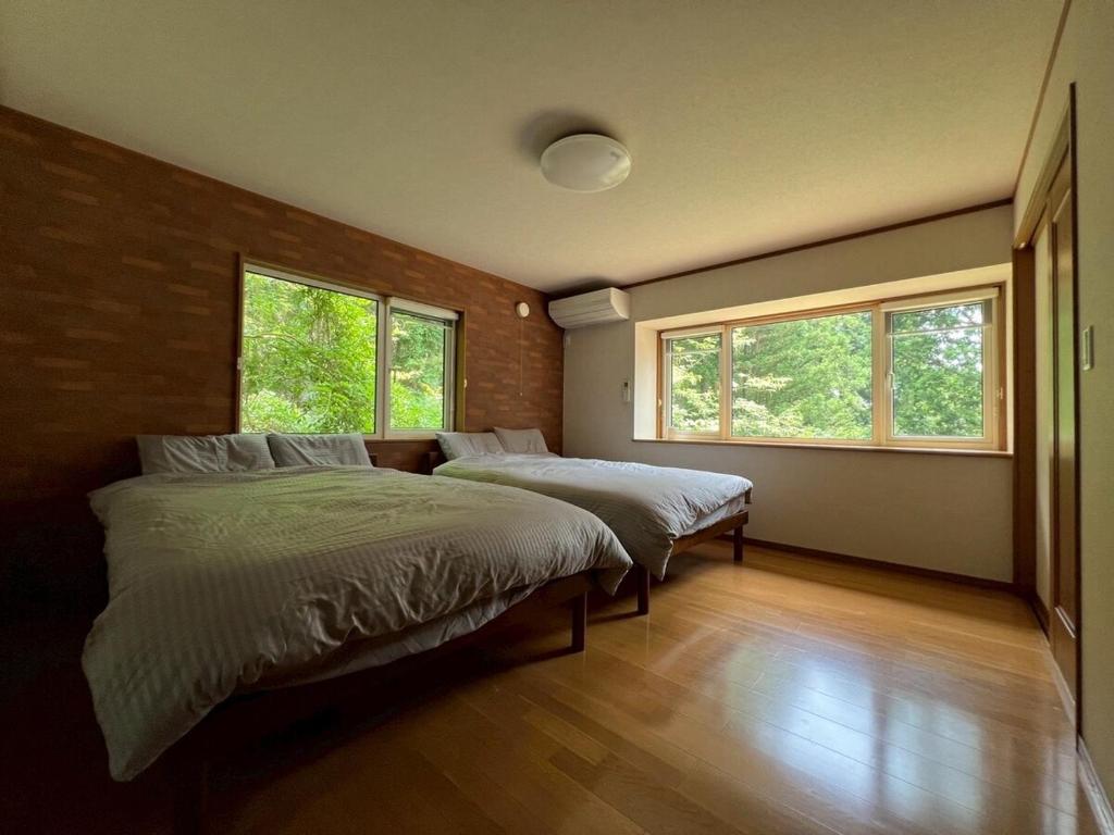 Postel nebo postele na pokoji v ubytování 日光萩垣面 Fabulous House 一棟貸