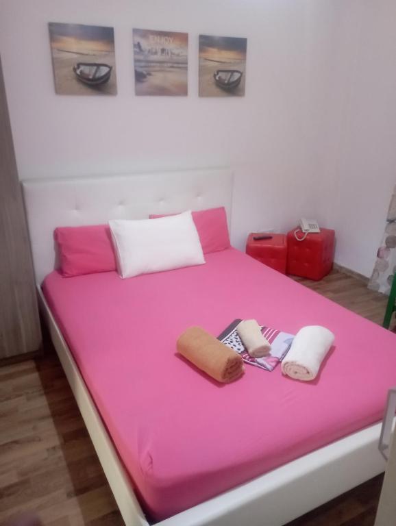 Postel nebo postele na pokoji v ubytování Tony Hotel