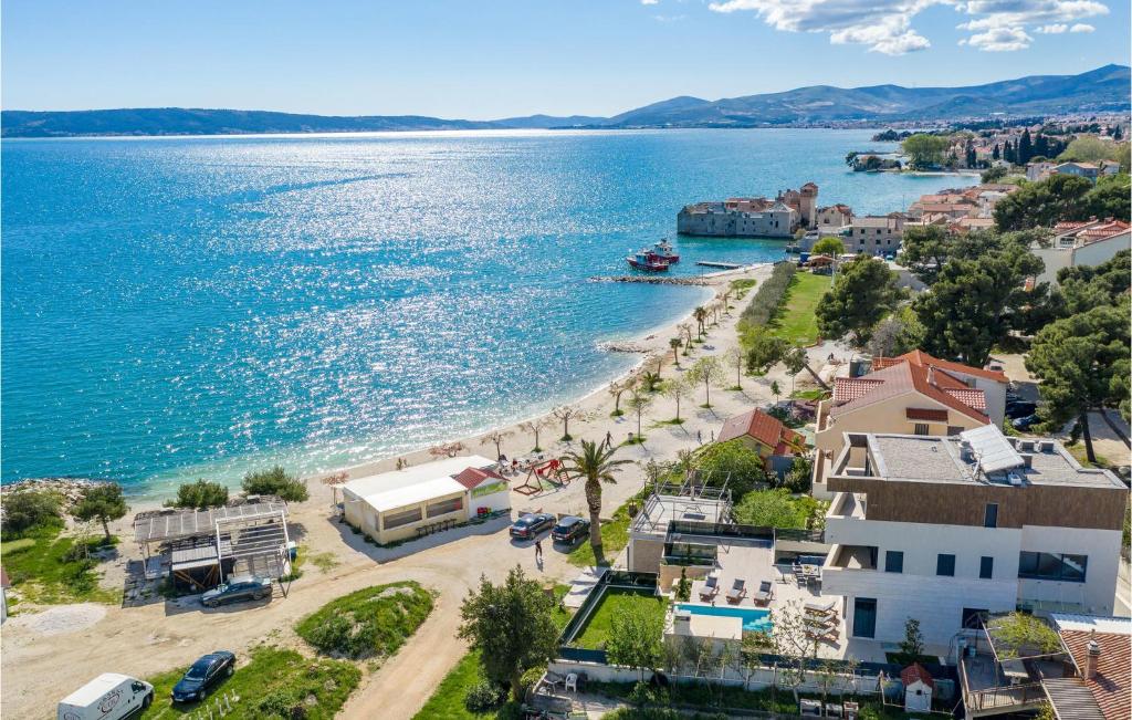 an aerial view of a beach and the ocean at Nice Home In Kastel Gomilica With Sauna in Kaštela