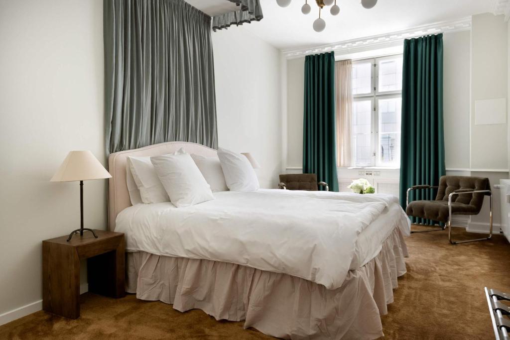 Ένα ή περισσότερα κρεβάτια σε δωμάτιο στο The Churchill 6 by Daniel&Jacob's