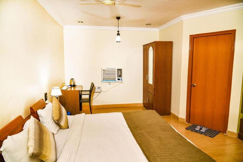Postel nebo postele na pokoji v ubytování The Jungle Resort Khajuraho