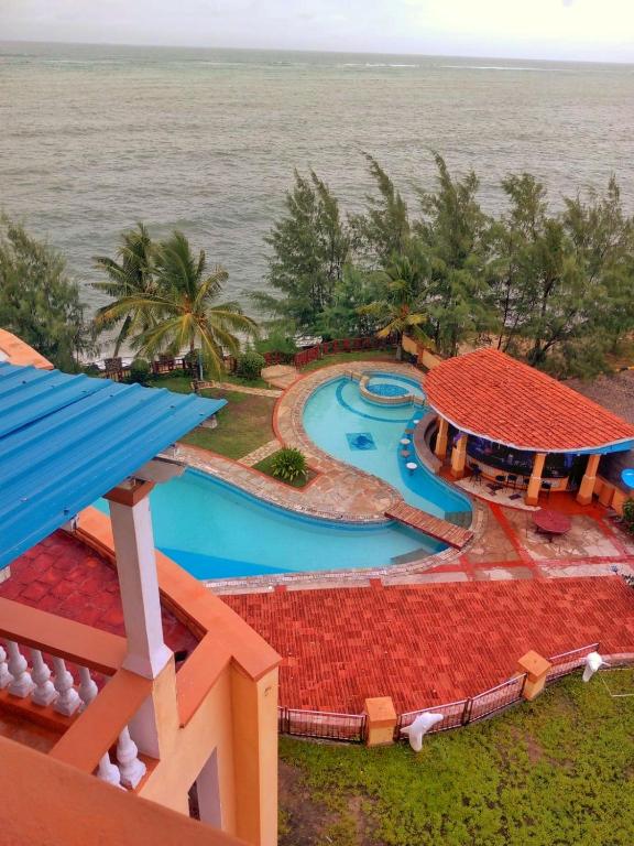 an aerial view of a resort with a swimming pool at Ocean Breeze Apartments,Shanzu in Mombasa