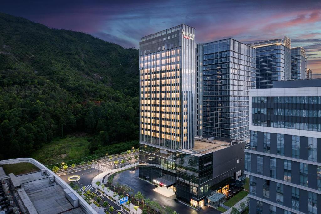 an aerial view of a tall building in a city at IntercityHotel Zhuhai Xiangzhounanping with Free Mini Bar in Zhuhai