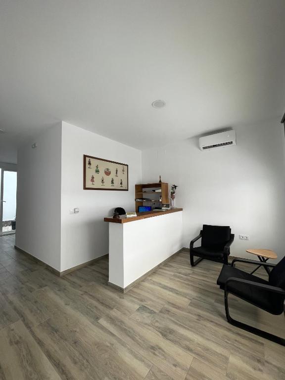 Posezení v ubytování Hostal Malia
