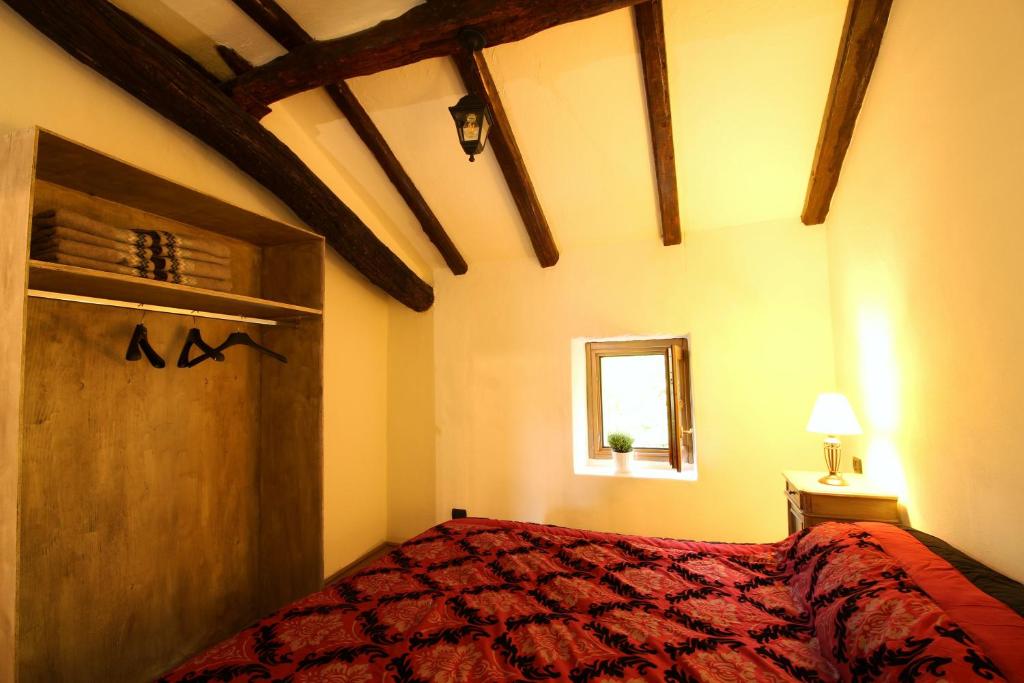 Łóżko lub łóżka w pokoju w obiekcie Country House Cozzena