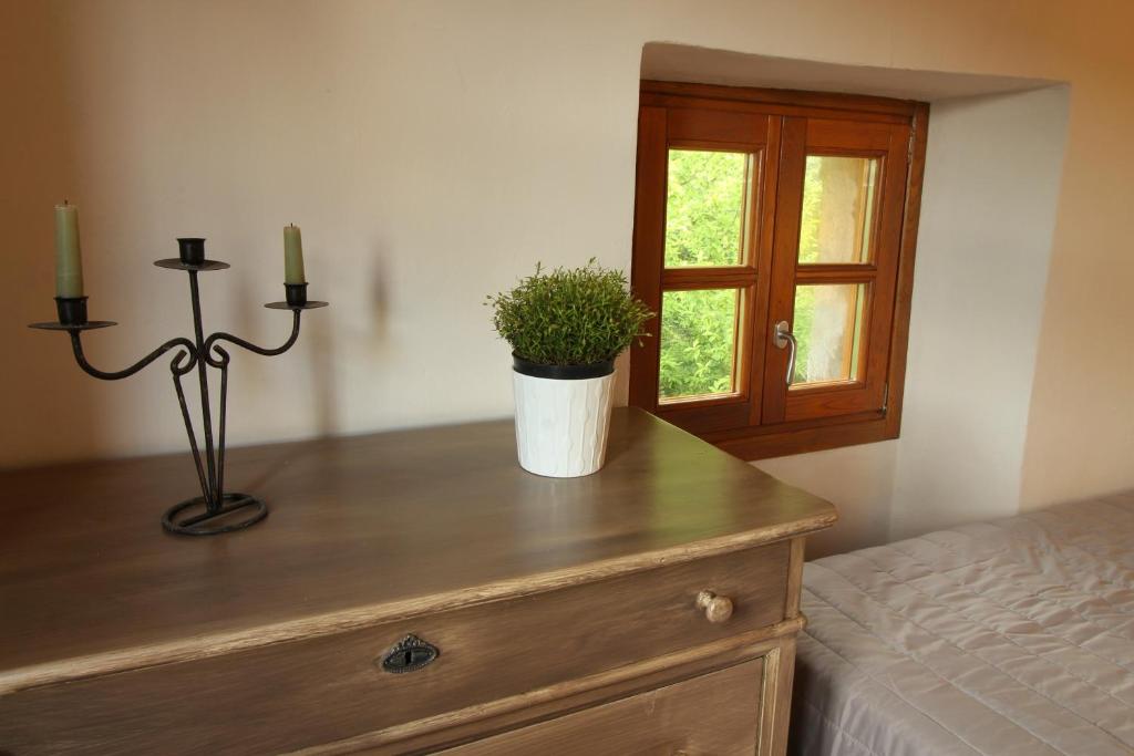 Łóżko lub łóżka w pokoju w obiekcie Country House Cozzena